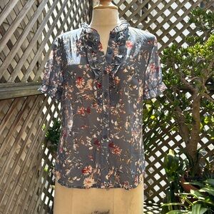 Allegra K Semi sheer blouse. Short sleeves,XS Floral with slate blue bkgd.  NWT
